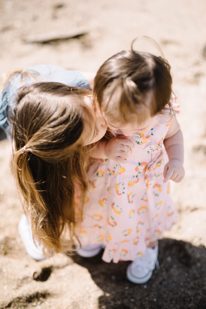 This life and style motherhood blogger is talking about the Best of Kids Fashion for Spring with these beach images taken of her two little ladies!