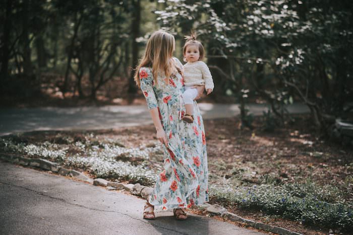 This blogger is 27 weeks with baby number three! Come check out her easy maternity style in this floral maxi dress!