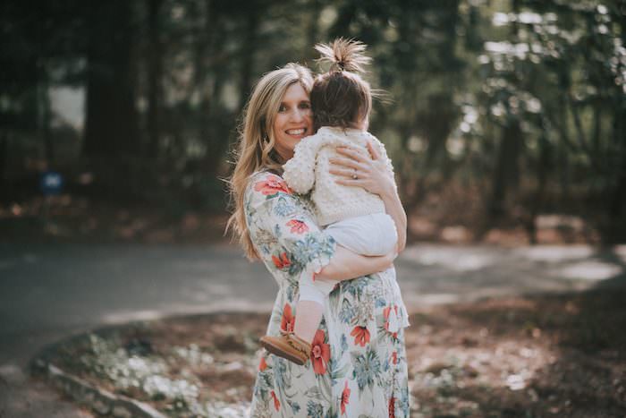 This blogger is 27 weeks with baby number three! Come check out her easy maternity style in this floral maxi dress!